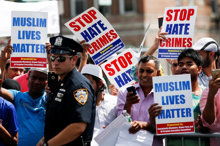 Image: Community members take part in a protest to demand stop hate crime during the funeral service of Maulama Akonjee, and Uddin in the Queens borough of New York City