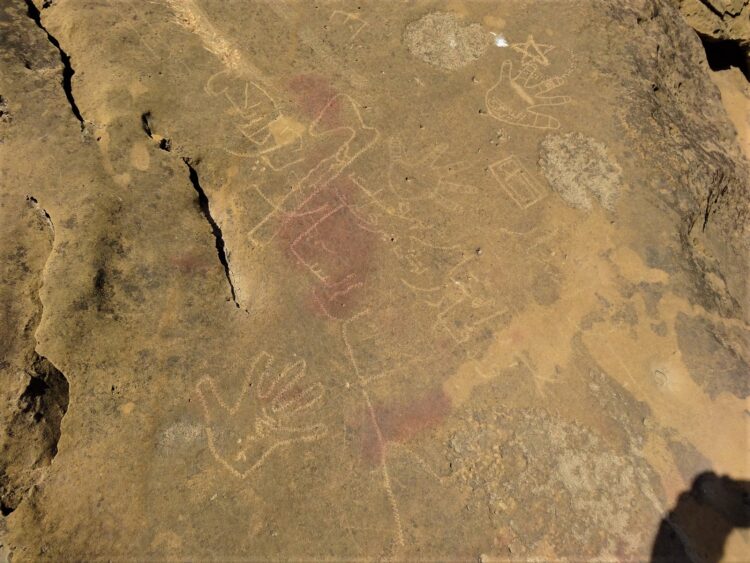 6-Hand-and-axe-petroglyphs-with-names-of-the-artists-at-Lahut-Buthi-Mol-Valley-750x563