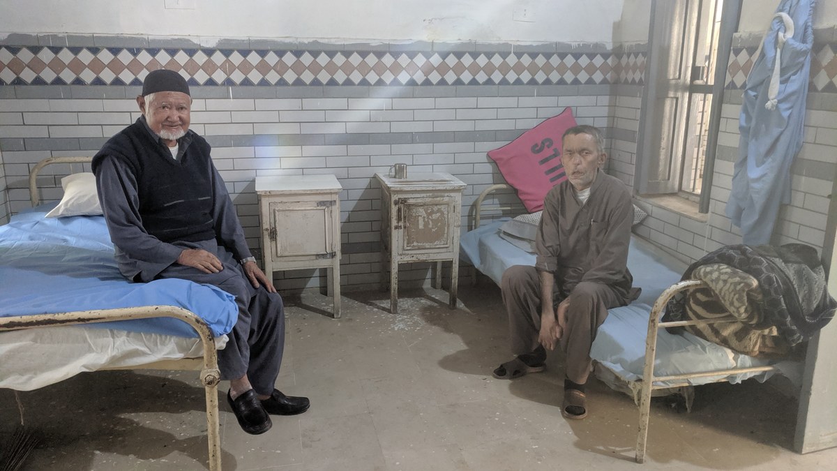 Muhammad Asal, (left) who is admitted at the KMC Leprosy Hospital in Manghopir Karachi, says he first came to the health facility during the India Pakistan war of 1965.