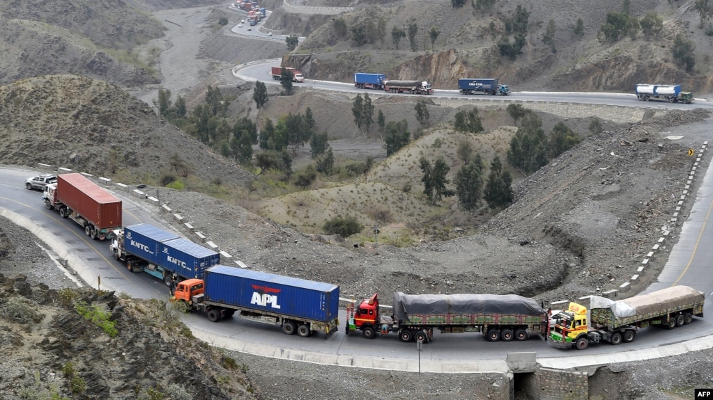 Cargo trucks drive through the mountainous area near Torkham by Afghanistan's border with Pakistan. (file photo)