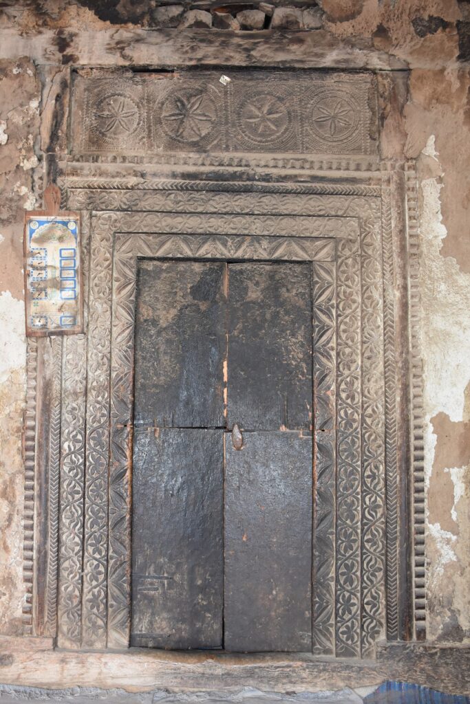 3.-Ornately-carved-wooden-door-of-the-mosque-683x1024