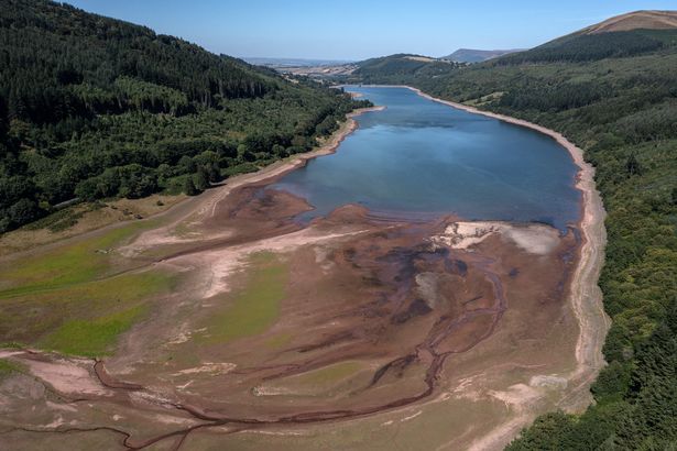 Low water levels are pictured at Talybont Reservoir, Wales, amid the ongoing heatwave