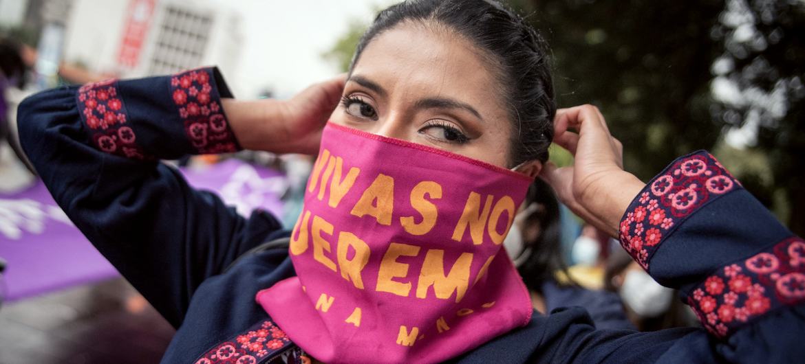 A woman participates in a march against gender violence in Quito Ecuador