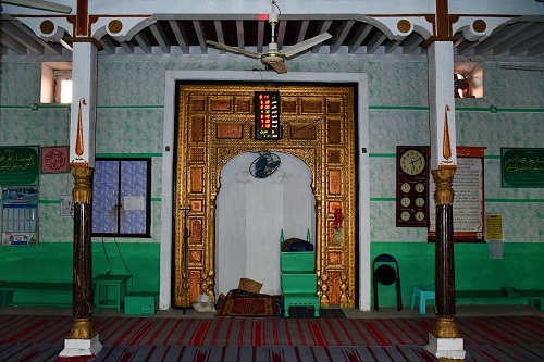 View of mihrab and wooden pillars in the Jamia mosque Thatta village