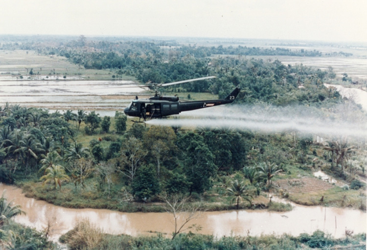 US helicopter spraying Agent Orange during the Vietnam War