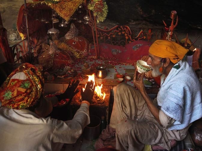 0- A devotee receives blessings at Hinglaj Mata Mandir (Picture credits to Reuters)