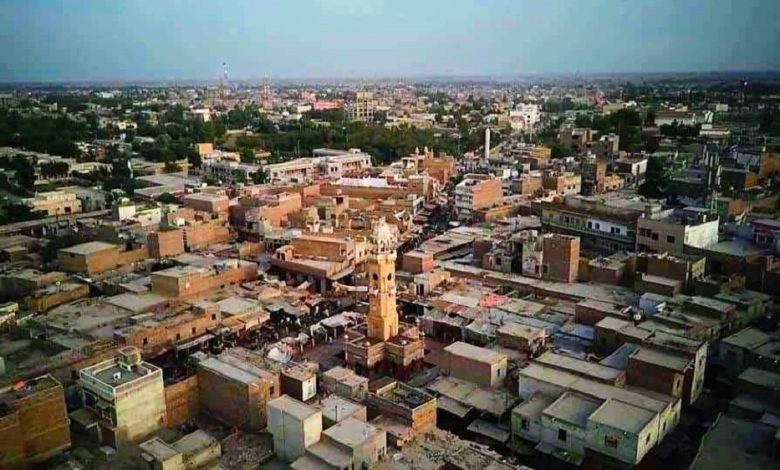 Photo of Victoria Clock Tower and the Christian Cemetery of Jacobabad