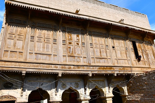 Wooden facade of Maari in Khaman village