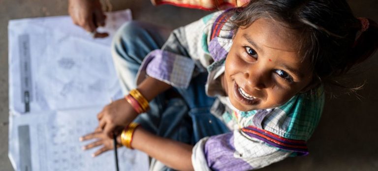 A young girl studies at home in Gujarat India - UNICEF - Panjwani