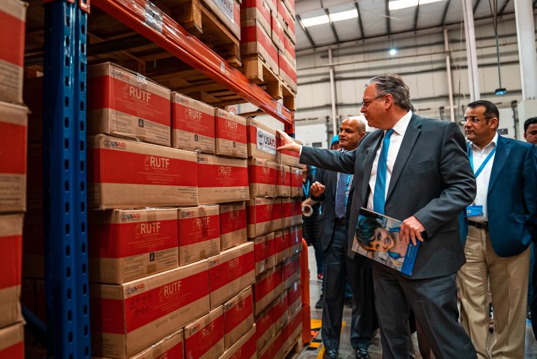 US Ambassador inspects USAID-procured food at a warehouse in Karachi