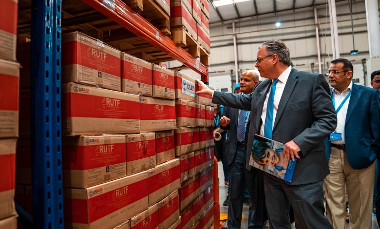 US Ambassador inspects USAID-procured food at a warehouse in Karachi