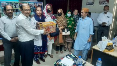 Photo of Gomibai Ladies’ Club officials present gifts to ailing children