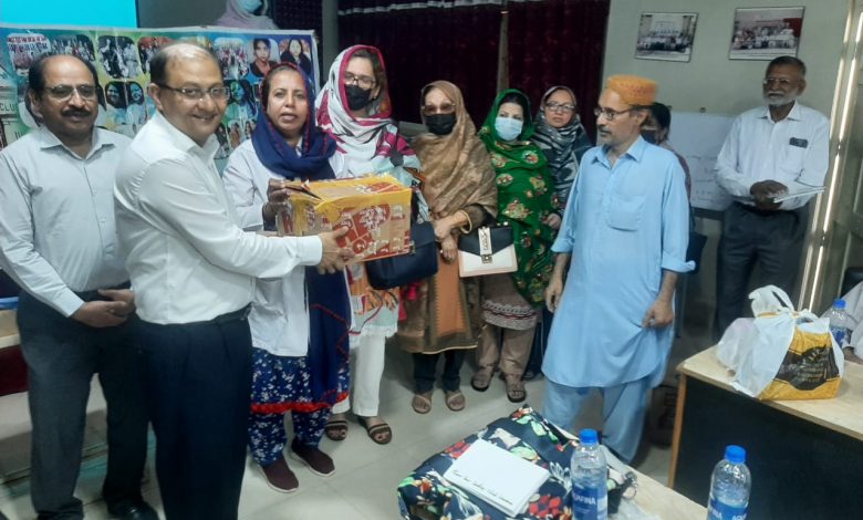 Photo of Gomibai Ladies’ Club officials present gifts to ailing children