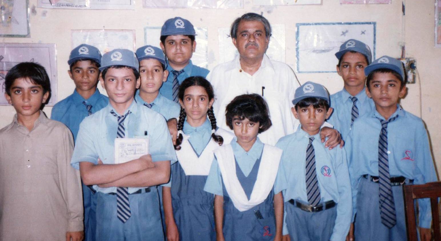 Maqsood Gul, with the students of his school