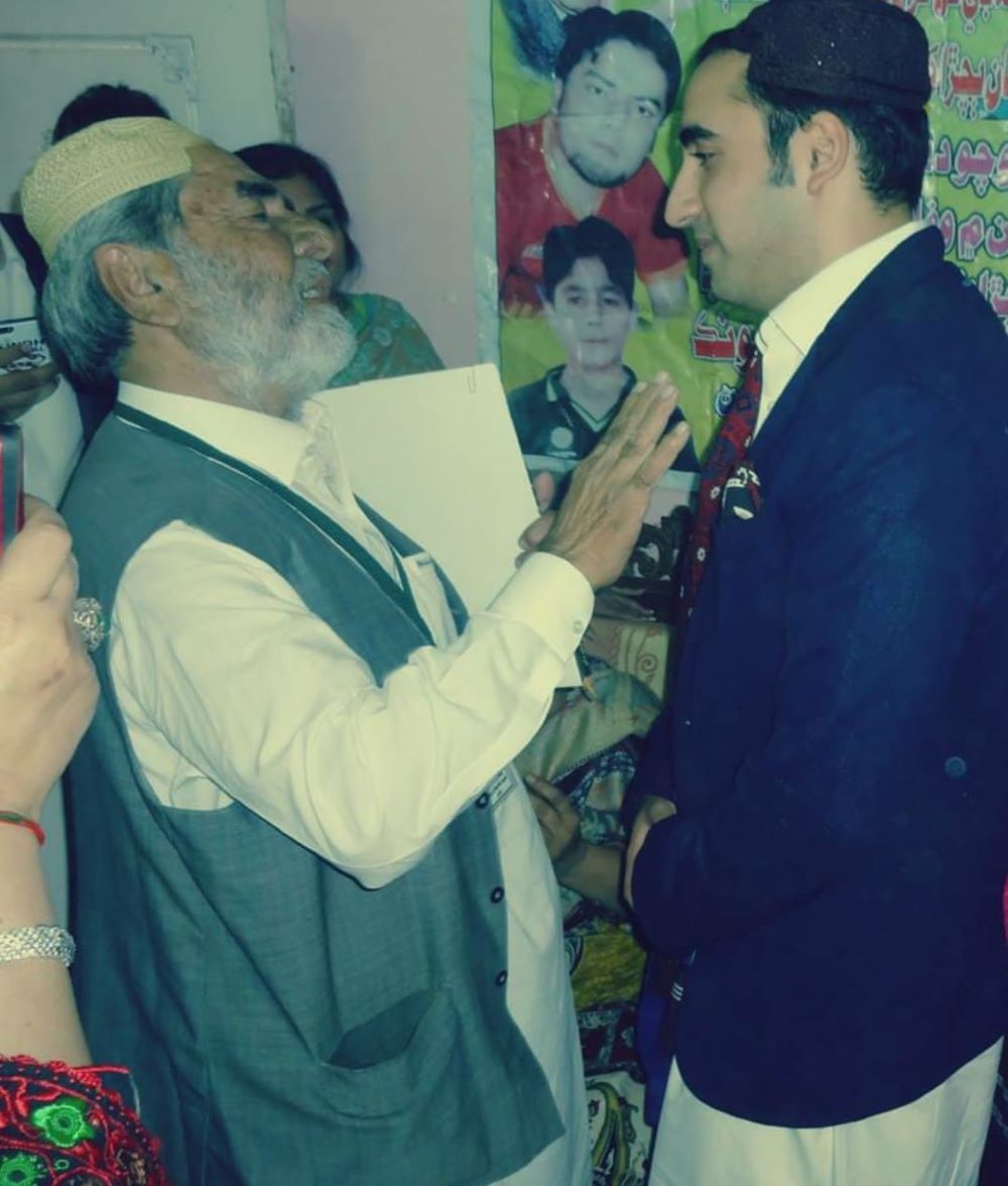 PPP Chairman Bilawal Bhutto with Abdul Sattar Qureshi during visit to deceased boy's home in 2013