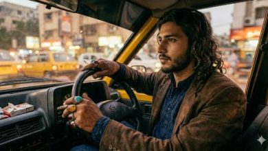 Taxi Driver with rings-Sindh Courier